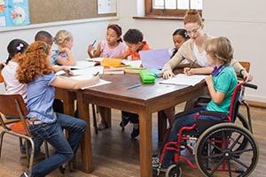 Disabled child in classroom