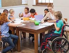 Disabled child in classroom