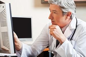 Doctor Reviewing a Generic Diagnostic