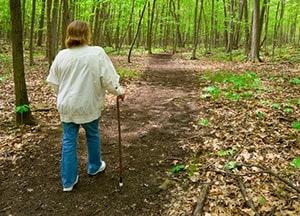 Person walking with a cane